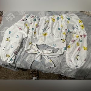 Butterfly Cropped top, ties in the back. Never worn, got off is SHEIN awhile ago